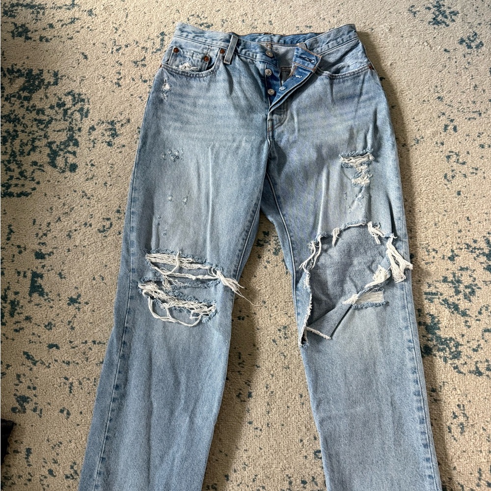 Distressed Levi’s Light Blue Jeans